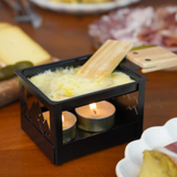 Raclette al lume di candela . Cookut Col. Nero